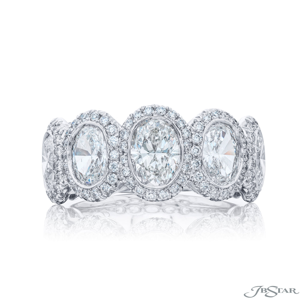 Lady's White Platinum Wedding Band With Bezel and Pave Diamonds